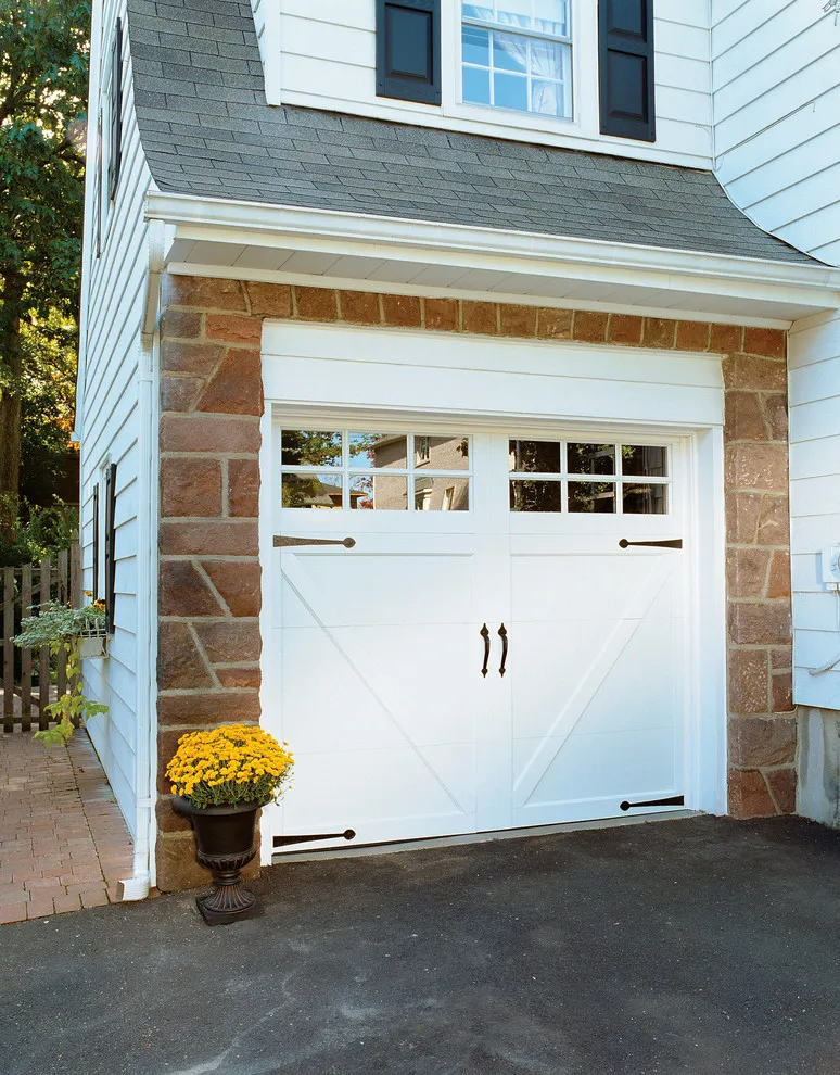 Clopay Coachman Collection carriage house garage door installation in an Atlanta residential home.